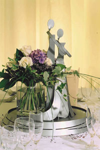 Little Ironies figurine table centrepieceswith flowers from Waow Studio